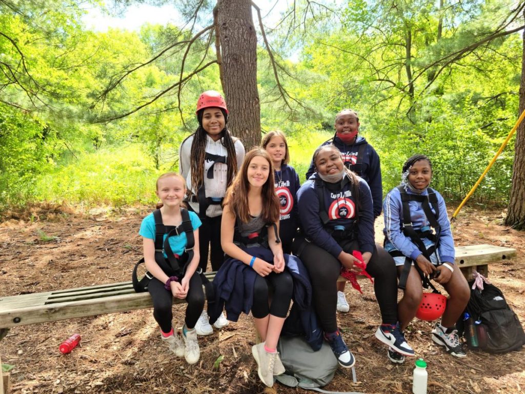 Group of IFSA Campers posing for a photo in the woods