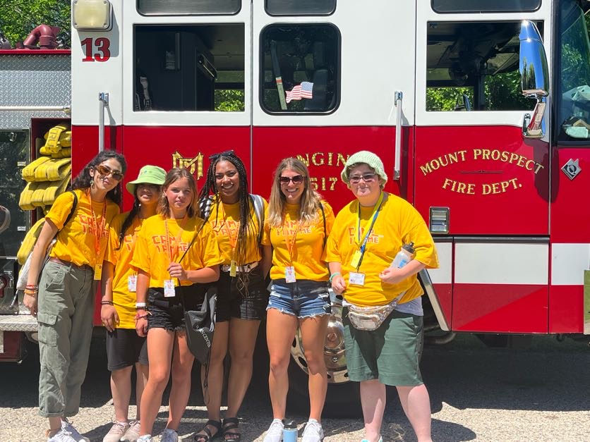 Camp I am Me campers and staff in front of Fire Engine