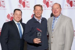 IFSA members present man with Above & Beyond award