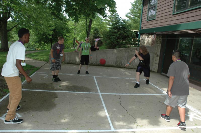Campers playing four square