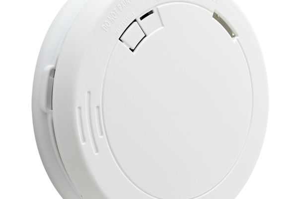Close up image of a white smoke alarm