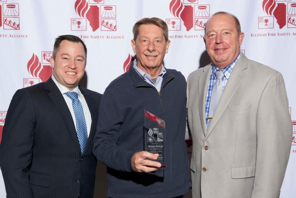 Three gentleman presenting IFSA Above & Beyond Volunteer Award